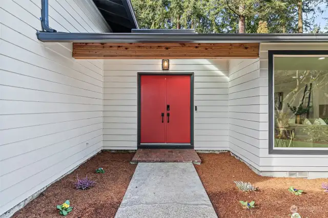 The main entrance features a cedar ceiling & a skylight