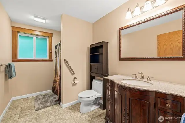 Bathroom off of upstairs primary bathroom.