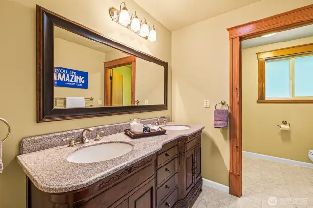 Full bathroom in upstairs hallway.