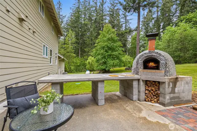 Wood-fired pizza oven.