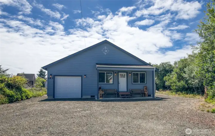 Lots of parking and plenty of room to add on another garage or carport.
