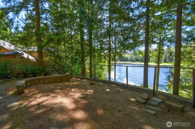 Back yard of house with view of the lake.
