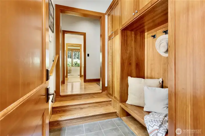 Mudroom connecting hallway nearest secondary bathroom and vestibule to the upper bedroom/bonus room. Pool is to the right in the hallway shown.