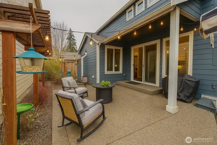 Charming courtyard, patio off of dining room is surprisingly private.    Fully fenced with large patio extends your living space to the outdoors. Garden space for shrubs and flowers.  The outdoor TV stays!