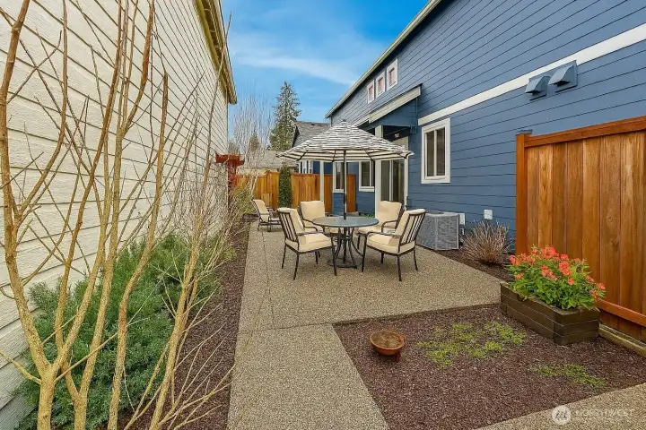 Full view of patio and garden space. Access from ally and dining room.  plenty of room for entertaining, pets and little gardening.  Low maintenance, sit back and enjoy!!