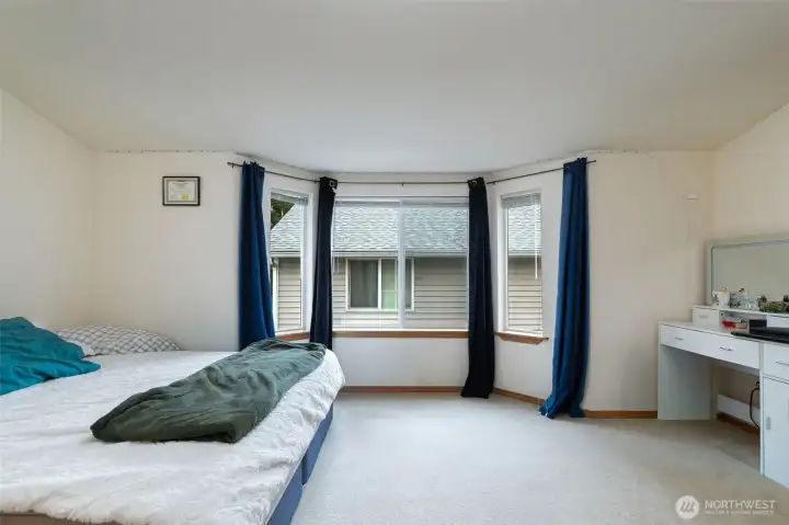 second bedroom on top level has a bay window