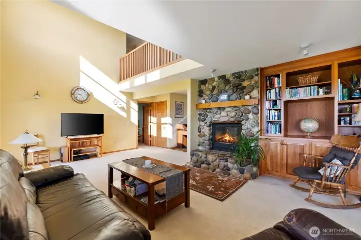 Wonderful light & bright with large windows & vaulted ceilings family room