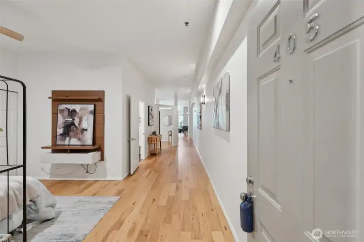 Hallway with Wide-Plank Hardwood Floors