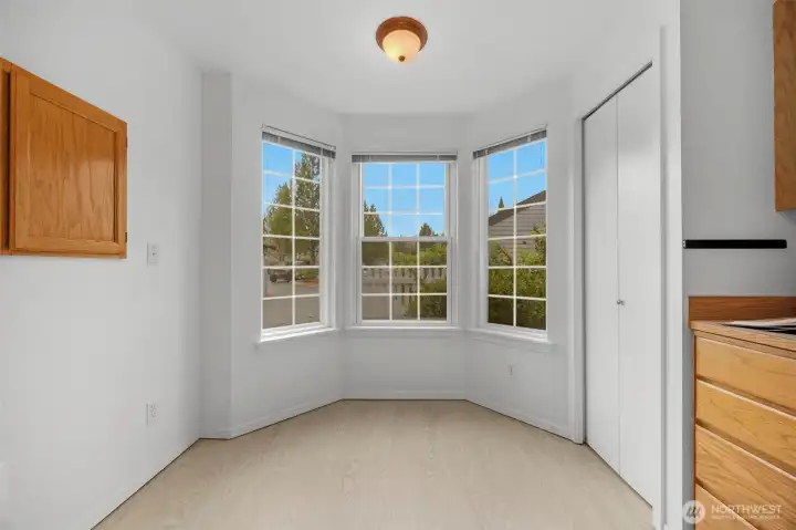 Sunny kitchen nook to sit and enjoy your morning coffee or would also make a nice office space.
