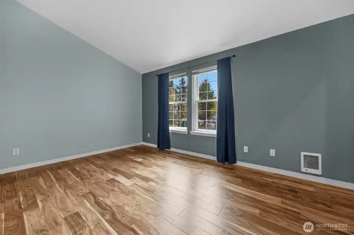 First of the two large primary bedrooms with attached bath.