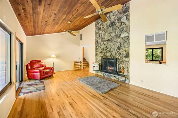 Living room with wood burning fireplace