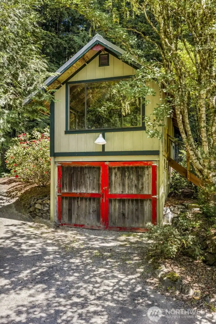 Carriage house single car garage and studio above