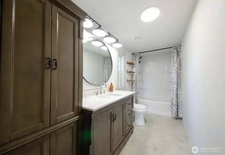 Primary bathroom with plenty of storage
