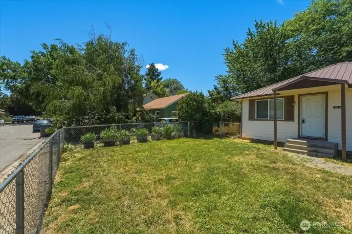 Private fenced area for upper unit
