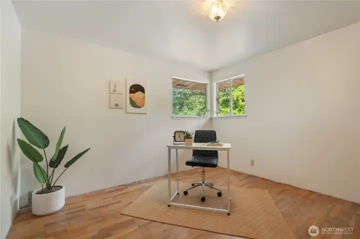 One of 3 bedrooms on the main floor is set up to be a home office.