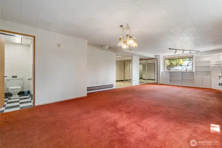 The downstairs rec room is huge! Endless possibilities. It also has a 3/4 bathroom off of this room.