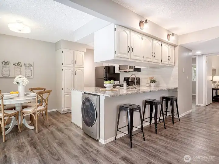 Freshly painted, updated floors, light fixtures and granite countertops!