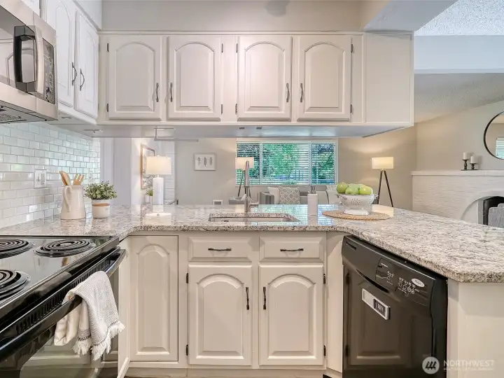 Plenty of counter space for the inspired chef, plus room for your guests to stay close without getting in your way!