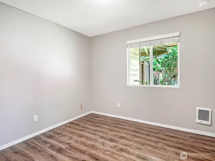 Second Bedroom with beautiful view of quiet side yard
