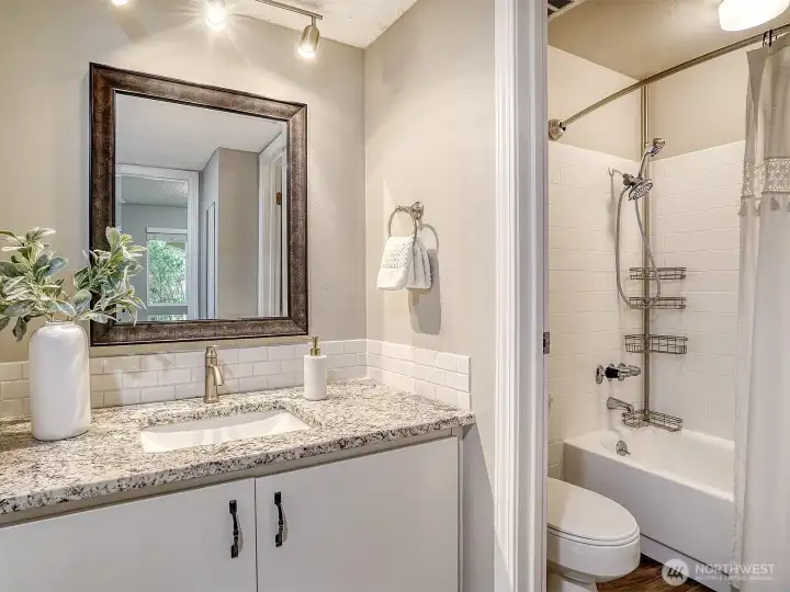 Convenient Bath layout allows for two getting ready at the same time!