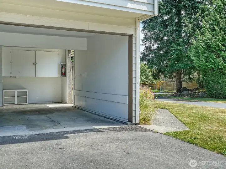 Dedicated parking, plus storage! Two parking spots- one covered, plus driveway space.