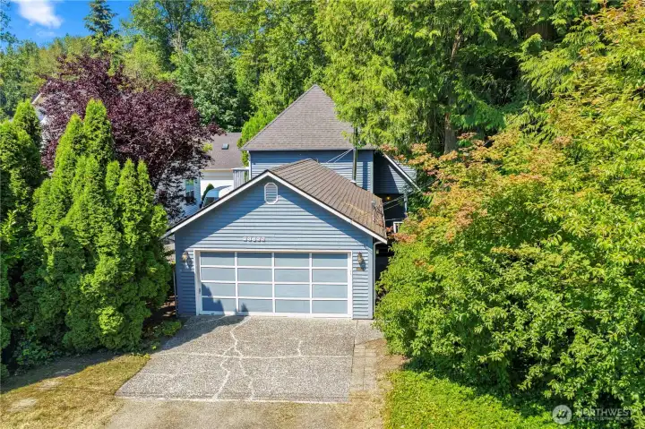 Front of House with driveway and 2 car garage