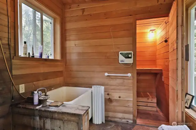 Bathhouse with shower, soaking tub & sauna.