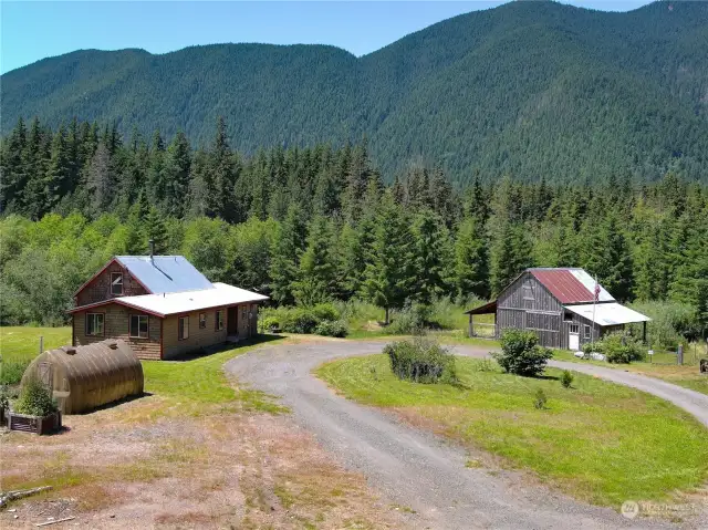 Truly the end of the road seclusion. At 158 acres, this homesite is one of the largest homesteads W of the Cascades. Probably the most secluded and level. Imagine your possibilities. State DNR land to the W for 1/2 mile, then the national forest beyond. The perfect neighbors ~