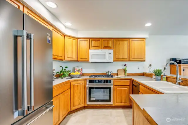 Kitchen has updated oven, refrigerator and dishwasher.