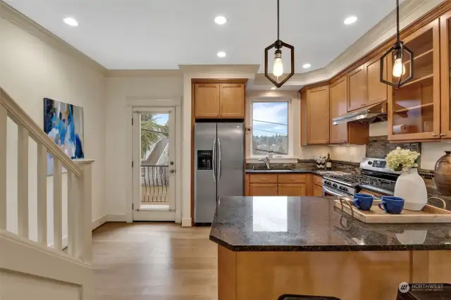 door off kitchen leads to ioutdoor balcony