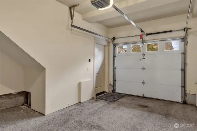 garage interior, entry door leads upstairs to main floor