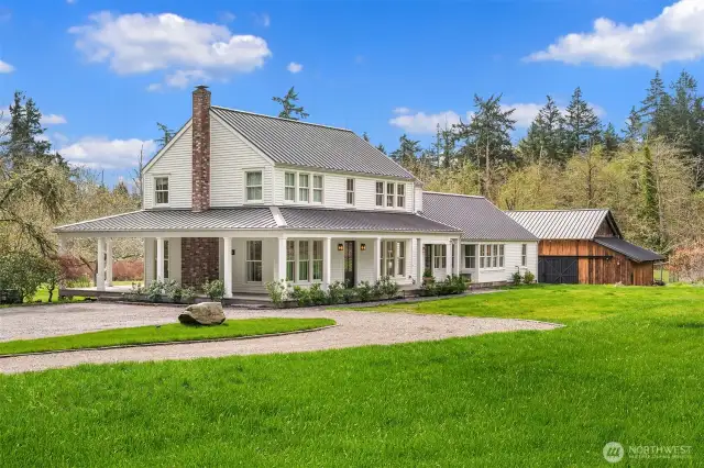 Nestled in the heart of Burton, this exquisite Vashon Island estate is a true masterpiece of design and craftsmanship