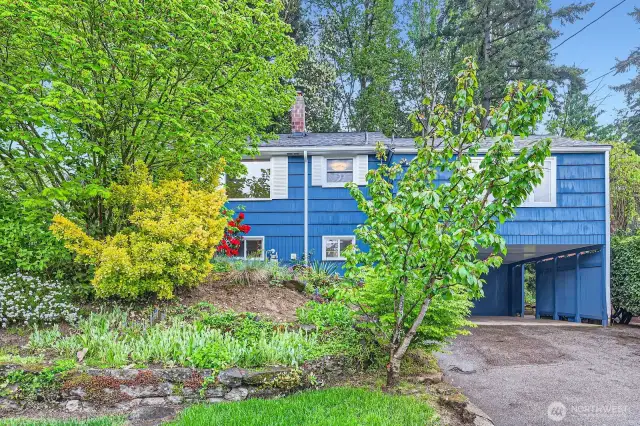 Gorgeous landscaping pops in the spring and summer in this spacious Olympic Hills 4-bedroom home.