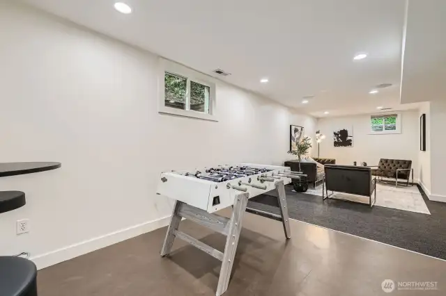 Gaming area with family room beyond.
