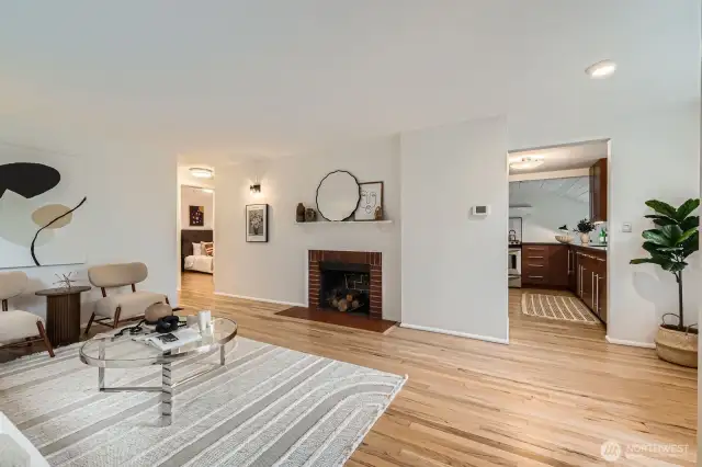 View of the living room as you enter the front door. The view to the right is through the kitchen and family room beyond.