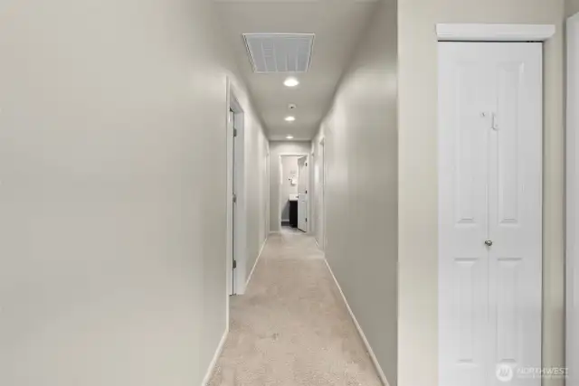 Let‘s move down the hall to see the other bedrooms.