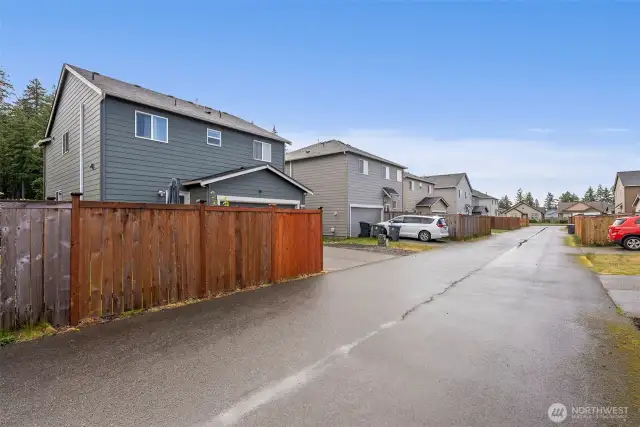 Easy and tucked away access to the garage at rear of home.