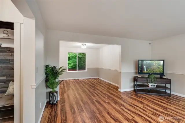 Front family room with walk-through to dining room and kitchen