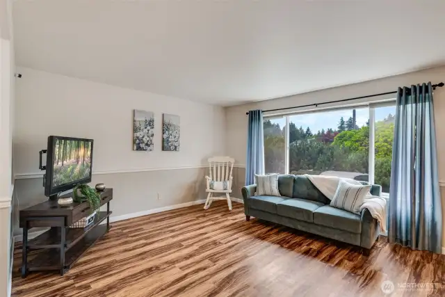 Inviting front family room with a large front window