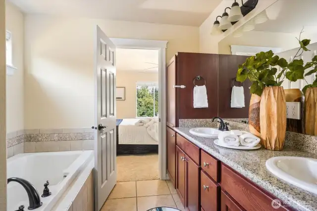 Huge soaking tub, dual vanities!