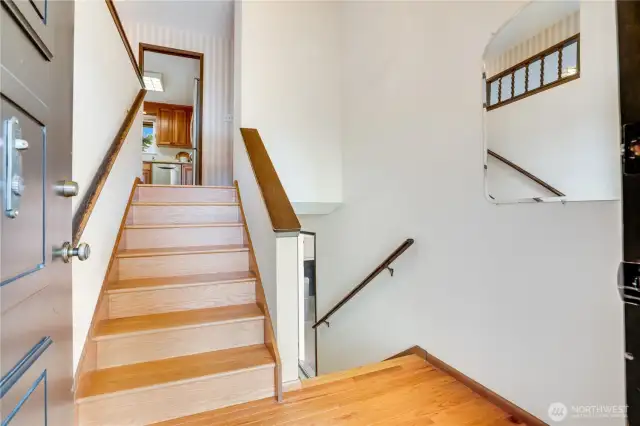The stairs both up and down are greatly improved by solid white oak treads and risers and wood trim installed this year.