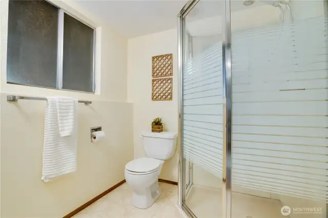 The suite includes this 3/4 bath with a stall shower.