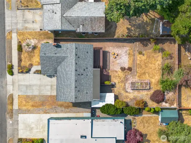 This 2,190 sq ft home (plus the 589 sq ft garage) is set on a 7,800 sq ft lot with a paved driveway, and a big, fenced yard.