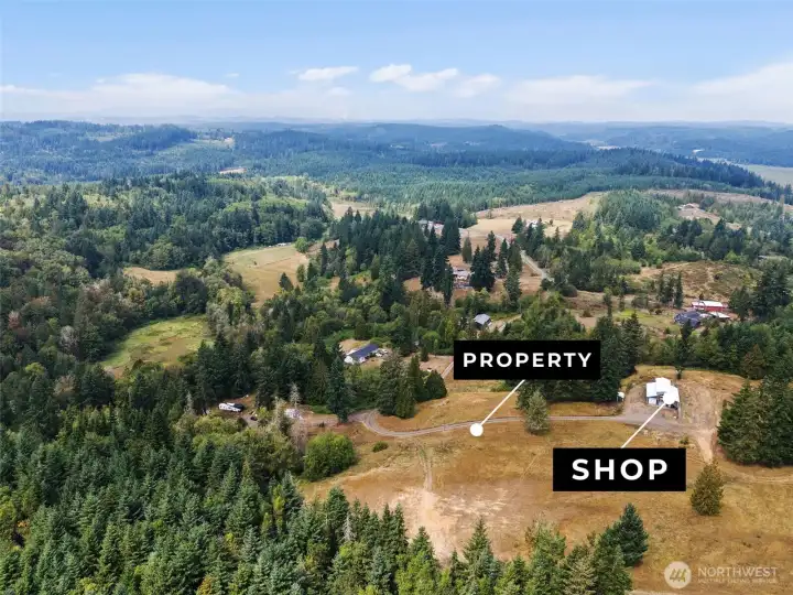 Nearly 20 acres of open space and trees on the end of a dead end road.