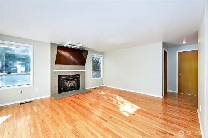 Family room with gas fireplace. *TV doesn't convey