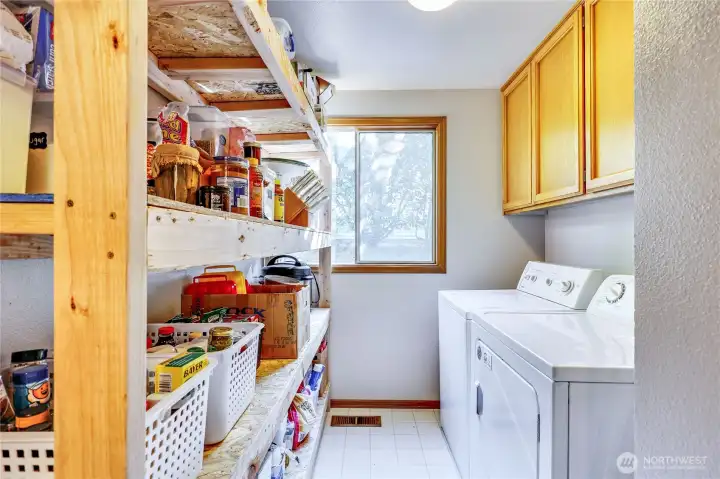 Laundry room on main level. Great extra storage!