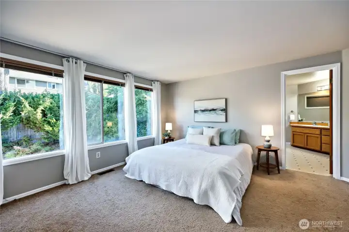 Primary suite with full bath and walk in closet.