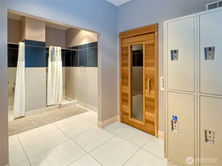 Men's locker room, showers and Sauna. Women's similary equipped 12 person spa currently being renovated