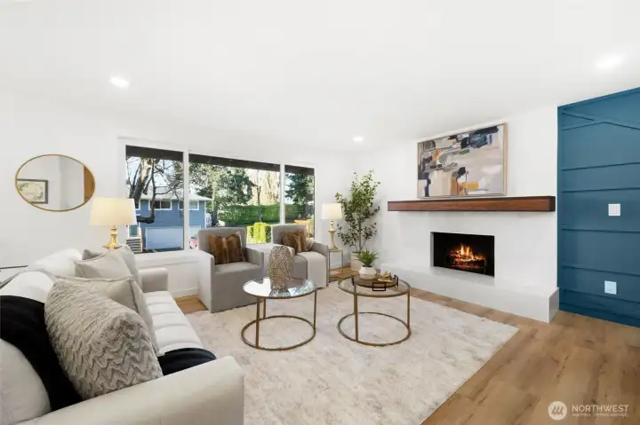 Bright open light in the upstairs family room that opens to the newly remodeled kitchen and eating area.