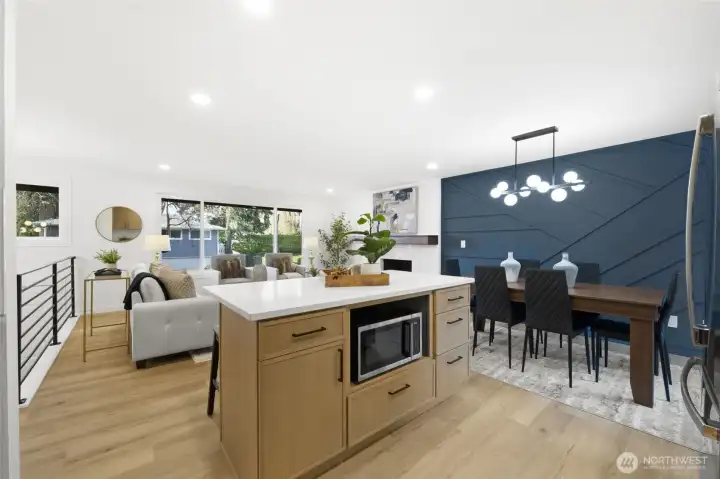 Kitchen island with new quartz counters and soft close cabinets
